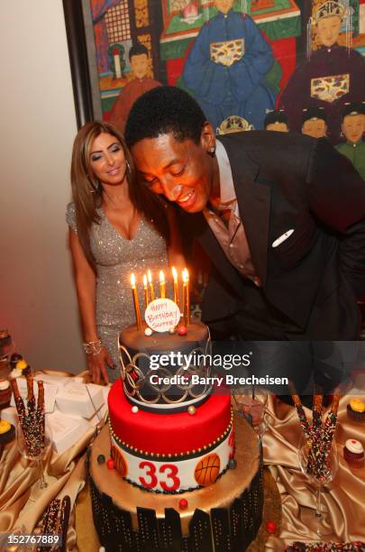 Larsa Pippen and Scottie Pippen attend the surprise birthday celebration for Scottie Pippen at Sunda on September 24, 2012 in Chicago, Illinois.