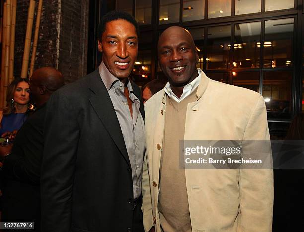 Scottie Pippen and Michael Jordan attend the surprise birthday celebration for Scottie Pippen at Sunda on September 24, 2012 in Chicago, Illinois.