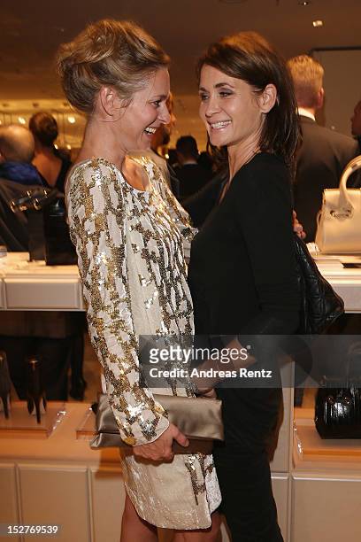 Lisa Martinek and Anja Kling attend the grand opening of 'The New Luxury, Beauty & The Loft' at KaDeWe department store on September 25, 2012 in...