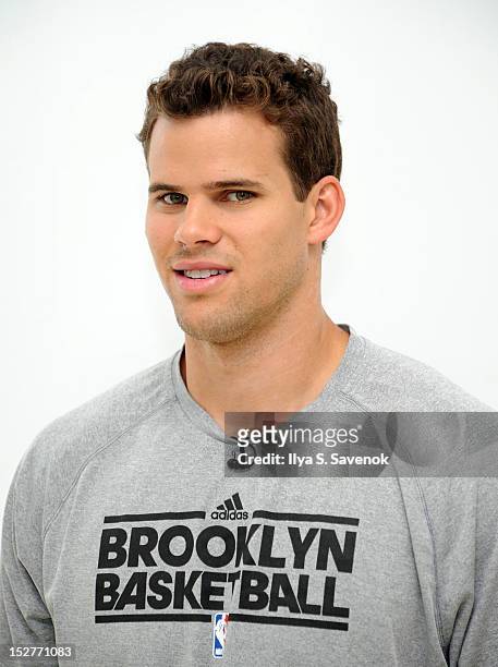 Player Kris Humphries attends The Kris Humphries Challenge For Kids Event at BEDFORD-STUYVESANT YMCA on September 25, 2012 in New York City.