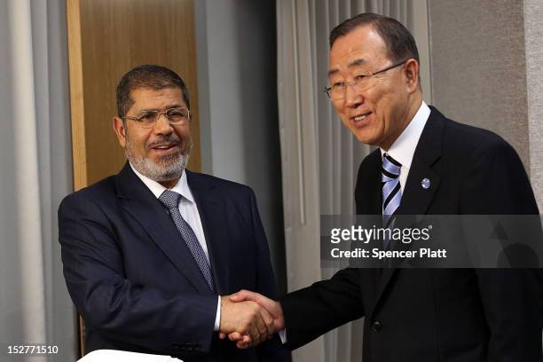 United Nations Secretary-General Ban Ki-moon meets with Egyptian President Mohamed Mursi at the United Nations during a meeting at the General...