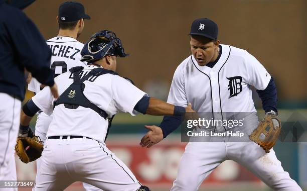 Gerald Laird and Miguel Cabrera of the Detroit Tigers celebrates a win over the Kansas City Royals at Comerica Park on September 25, 2012 in Detroit,...