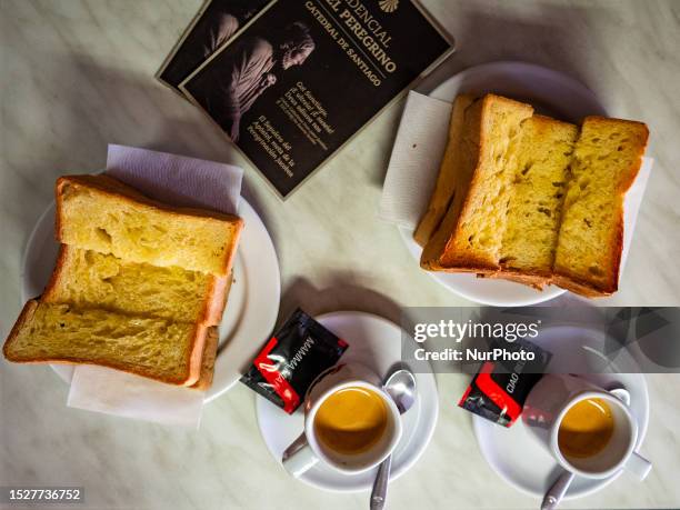 View of a traditional Portuguese breakfast, with torradas , and the Portuguese espresso . While walking the Portuguese Camino Coastal Route, on June...