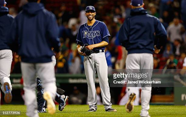 David Price of the Tampa Bay Rays laughs with teammates after pitching a complete game against the Boston Red Sox during the game on September 25,...