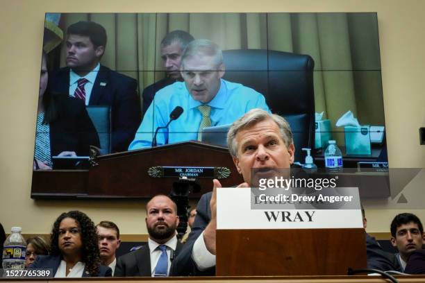 Director Christopher Wray responds to committee chairman Rep. Jim Jordan during a House Judiciary Committee hearing about oversight of the Federal...