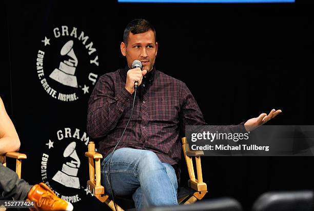 Producer Kaskade gets interviewed at an "Up Close & Personal with Steve Aoki and Kaskade" Q&A session for GRAMMY U Los Angeles at Los Angeles Film...