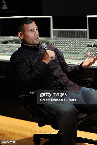 Producer Kaskade gets interviewed at an "Up Close & Personal with Steve Aoki and Kaskade" Q&A session for GRAMMY U Los Angeles at Los Angeles Film...