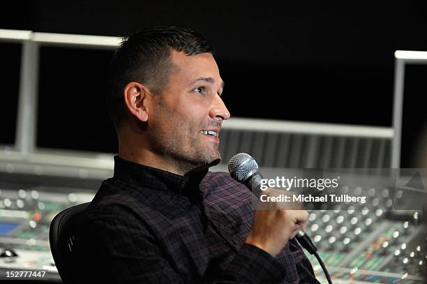 Producer Kaskade gets interviewed at an "Up Close & Personal with Steve Aoki and Kaskade" Q&A session for GRAMMY U Los Angeles at Los Angeles Film...