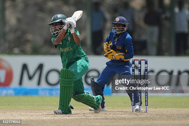 Trisha Chetty of South Africa in action as Dilani Manodara of Sri Lanka watches from the stumps during the ICC Women's World Twenty20 Group B match...