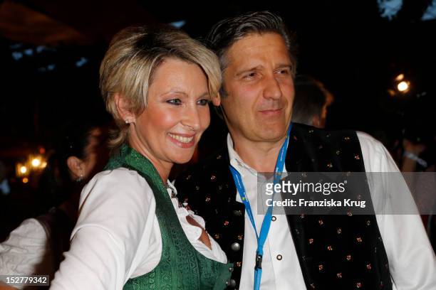 Claudia Jung and Hans Singer attend the 'Goldstar TV Wiesn' as part of the Oktoberfest beer festival at Weinzelt on September 25, 2012 in Munich,...