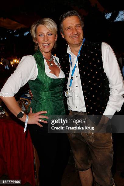 Claudia Jung and Hans Singer attend the 'Goldstar TV Wiesn' as part of the Oktoberfest beer festival at Weinzelt on September 25, 2012 in Munich,...