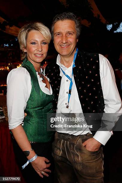 Claudia Jung and Hans Singer attend the 'Goldstar TV Wiesn' as part of the Oktoberfest beer festival at Weinzelt on September 25, 2012 in Munich,...
