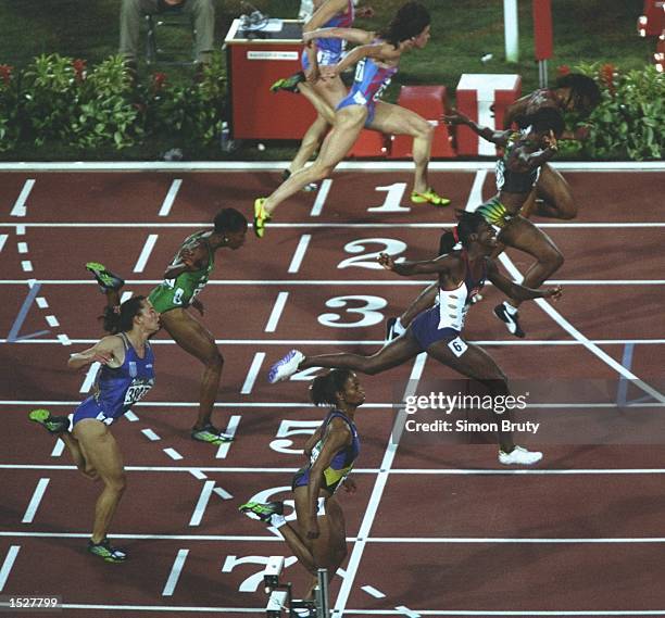 Gail Devers of the USA, lane 3, wins gold in the womens 100 metres at the Olympic Stadium at the 1996 Centennial Olympic Games in Atlanta, Georgia....