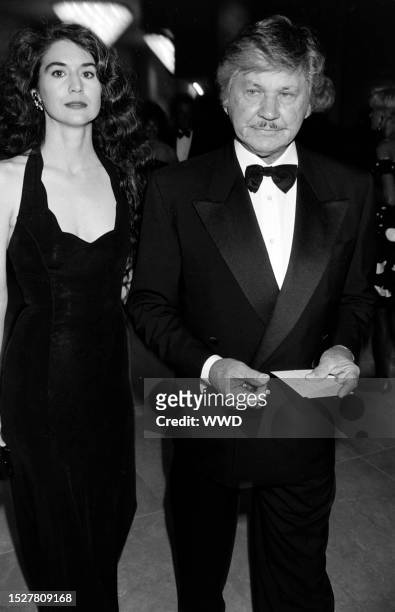 Kim Weeks and Charles Bronson attend an event at the Beverly Hilton Hotel in Beverly Hills, California, on October 2, 1992.