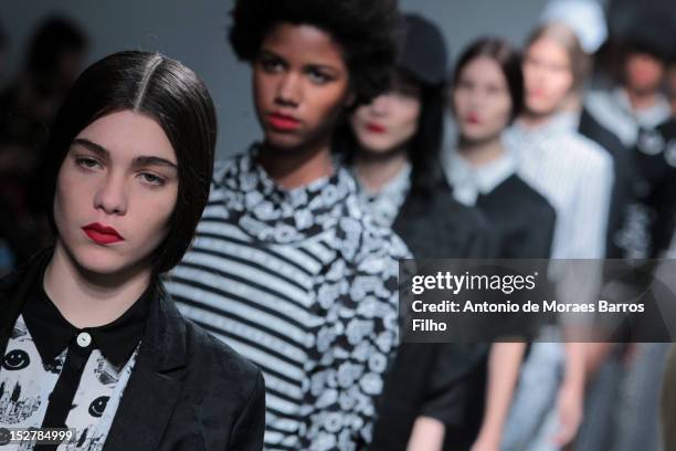 Model walks the runway during theDevastee Spring / Summer 2013 show as part of Paris Fashion Week at Espace Commines on September 26, 2012 in Paris,...