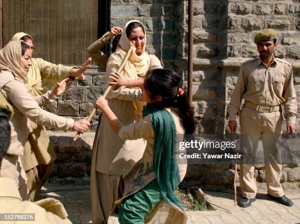 Indian Police Clash With Female Students In Kashmir Indian Police Clash With Female Students In Kashmir