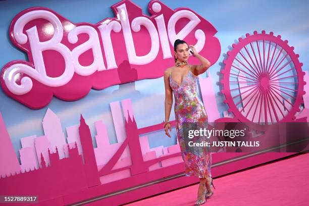 English singer-songwriter Dua Lipa poses on the pink carpet upon arrival for the European premiere of "Barbie" in central London on July 12, 2023.