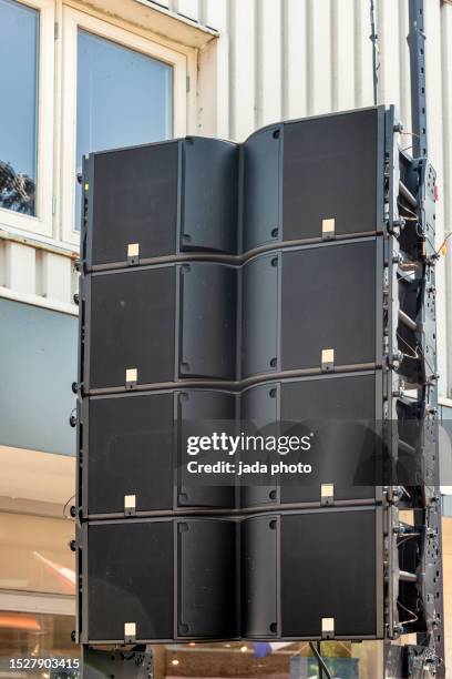 sound system speakers hang outside from a suspension construction - concert speakers stock pictures, royalty-free photos & images