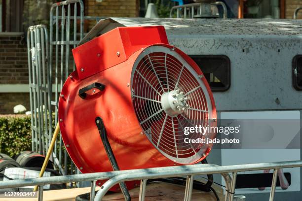 professional orange wind ventilator stands outside - ventilator illustration stock pictures, royalty-free photos & images