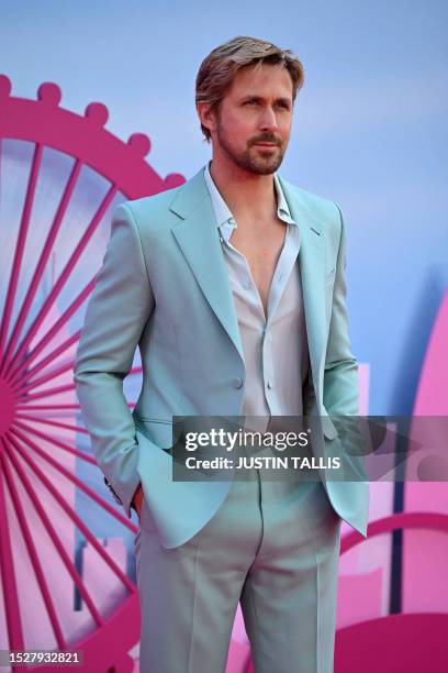 Canadian actor Ryan Gosling poses on the pink carpet upon arrival for the European premiere of "Barbie" in central London on July 12, 2023.