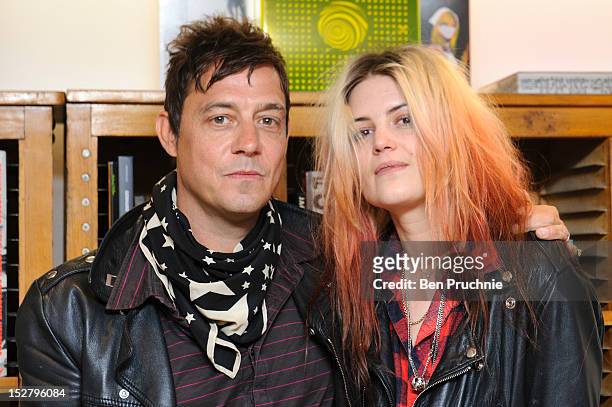 Jamie Hince and Alison Mosshart of The Kills meets fans and signs copies of 'Dream and Drive' on September 26, 2012 in London, England.