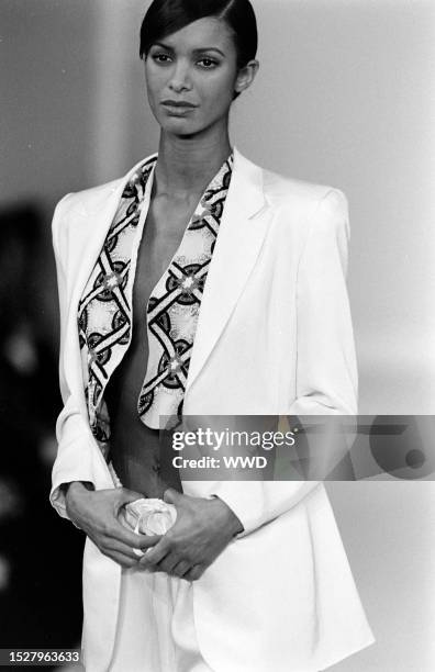 Model Maureen Gallagher walks the runway in the Tracy Reese for Magaschoni Spring 1994 Ready to Wear Runway Show on November 4 in New York City....