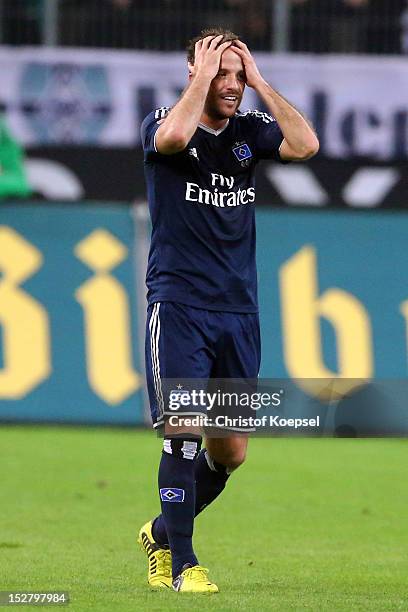 Rafael van der Vaart of Hamburg celebrates the first goal during the Bundesliga match between Borussia Moenchengladbach and Hamburger SV at Borussia...