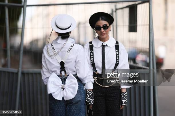 Snehal and Jyoti Babani seen outside Chanel show wearing round logo Chanel sunnies, Chanel logo strap ons, white Chanel blouses, Chanel pearl belts,...