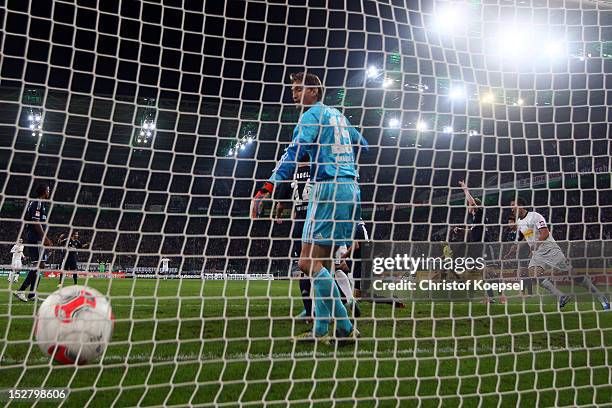 Rene Adler of Hamburg gets the first goal of Martin Stranzl of Moenchengladbach during the Bundesliga match between Borussia Moenchengladbach and...