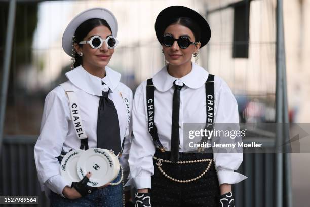 Snehal and Jyoti Babani seen outside Chanel show wearing round logo Chanel sunnies, Chanel logo strap ons, white Chanel blouses, Chanel pearl belts,...