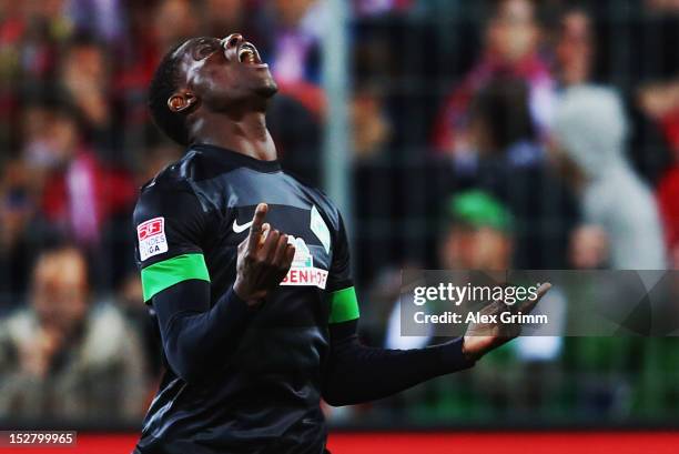 Joseph Akpala of Bremen celebrates his team's first goal during the Bundesliga match between SC Freiburg and SV Werder Bremen at MAGE SOLAR Stadium...
