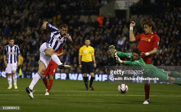 Gabriel Tamas of West Brom scorers the first goal during the Capital One Cup third round match between West Bromwich Albion and Liverpool at The...