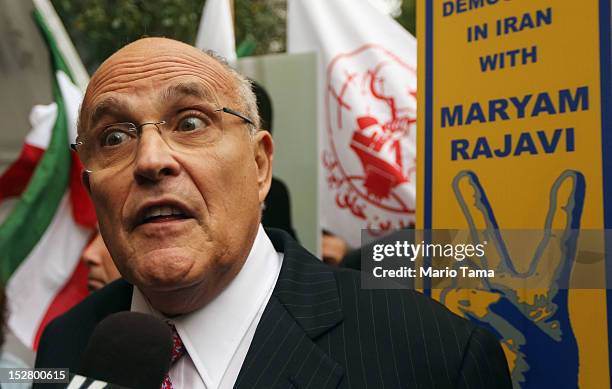 Former New York Mayor Rudolph Giuliani speaks to the media at a rally of groups opposing Iranian President Ahmadinejad’s speech at the United Nations...