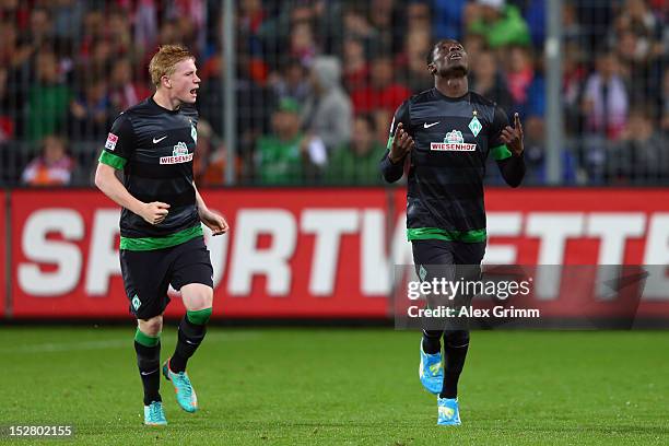 Joseph Akpala of Bremen celebrates his team's first goal with team mate Kevin de Bruyne during the Bundesliga match between SC Freiburg and SV Werder...