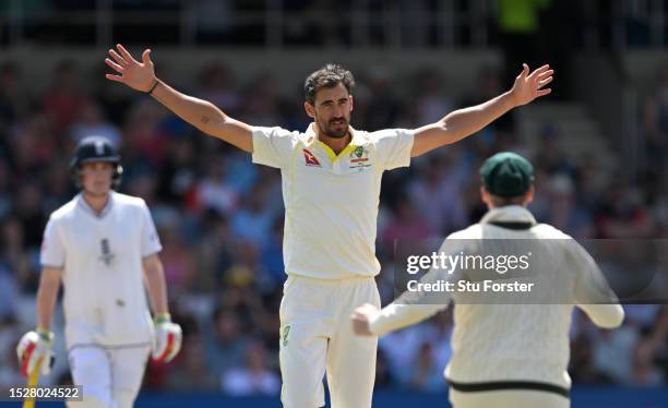 Mitchell Starc of Australia celebrates after dismissing Ben Stokes of England following a successful appeal during Day Four of the LV= Insurance...