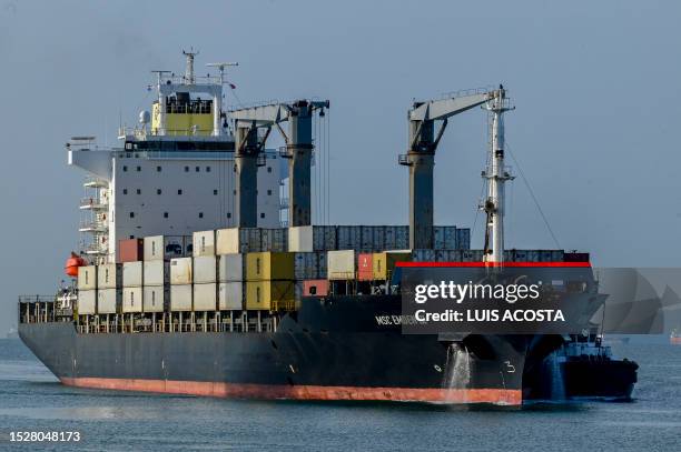 Ship navigates the Panama Canal in the area of the Americas' Bridge in Panama City on June 12, 2023.