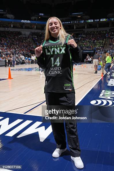 Paige Bueckers poses for a photo during the game between the Dallas ...