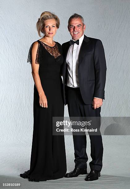 Paul McGinley of Europe poses with his wife Ally for a portrait at the Ryder Cup host hotel prior to the start of the 39th Ryder Cup Gala on...