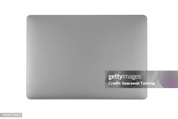 modern laptop computer isolated on white background. top view object and close up image. - chiuso foto e immagini stock