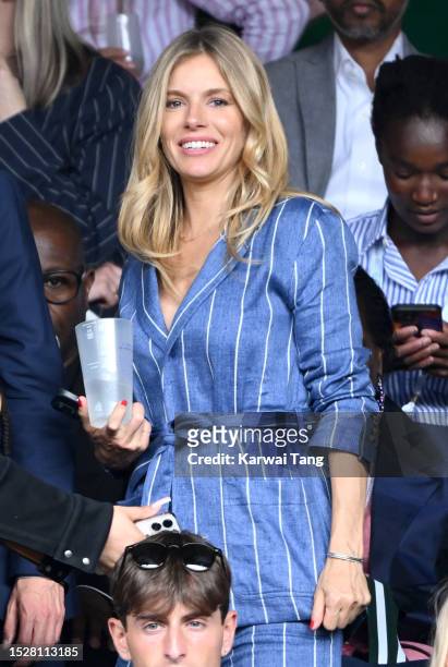 Sienna Miller attends day seven of the Wimbledon Tennis Championships at the All England Lawn Tennis and Croquet Club on July 09, 2023 in London,...