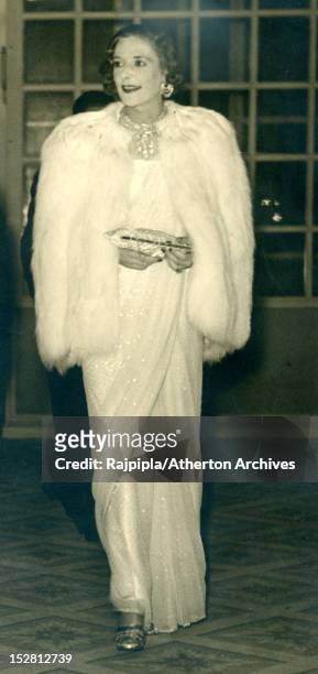 Maharani Ella Devi of Rajpipla arriving for a gala evening at a casino in Deauville, France, August 1948.