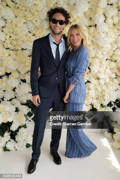 Sienna Miller and Oli Green, wearing Ralph Lauren, attends the Polo Ralph Lauren & British Vogue event during The Championships, Wimbledon at All...