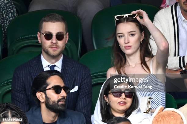 Cameron Fuller and Phoebe Dynevor attend day seven of the Wimbledon Tennis Championships at the All England Lawn Tennis and Croquet Club on July 09,...