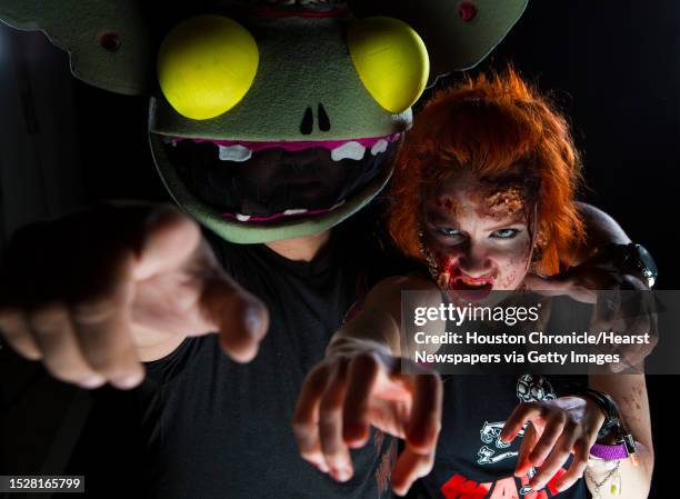 Jose Reyna and Lady Cocchia vice president of the Houston Zombie Walk prepare for the Houston Halloween Festival and Horrorcon which will take place...
