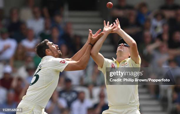 Pat Cummins of Australia catches Harry Brook despite the arrival of Mitchell Starc during the fourth day of the 3rd Test between England and...