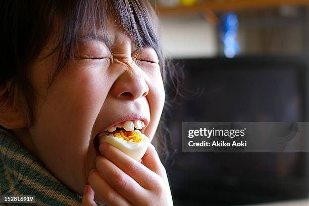 eating boiled egg - kid boiled egg stock pictures, royalty-free photos & images