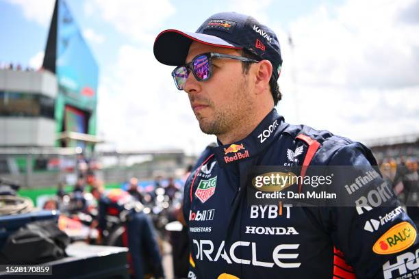 Sergio Perez of Mexico and Oracle Red Bull Racing looks on from the grid prior to the F1 Grand Prix of Great Britain at Silverstone Circuit on July...