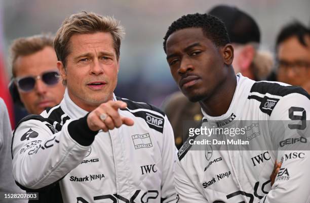 Brad Pitt, star of the upcoming Formula One based movie, Apex, and Damson Idris, co-star of the upcoming Formula One based movie, Apex, look on from...
