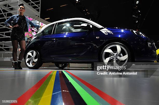 The new Opel Adam car sits on display at the Paris Auto Show on September 27, 2012 in Paris, France. Opel, which has been owned by General Motors...