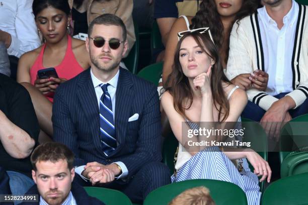 Cameron Fuller and Phoebe Dynevor attend day seven of the Wimbledon Tennis Championships at the All England Lawn Tennis and Croquet Club on July 09,...